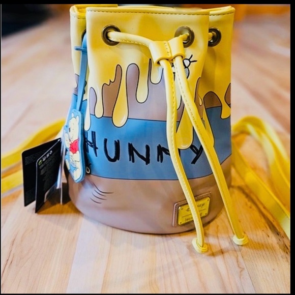 Loungefly Handbags - NWT Loungefly Winnie the Pooh convertible